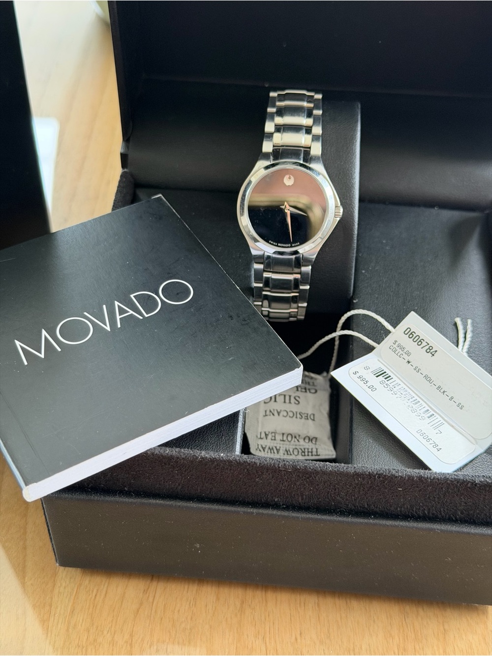 Movado Stainless Steel Bracelet Watch Black Sunray Dial 
 01.3.14.1236